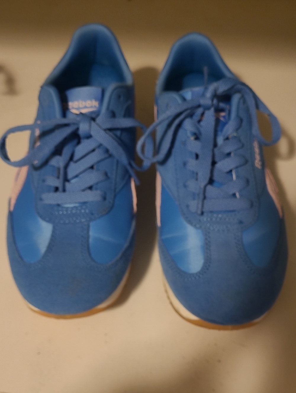Reebok Blue Sneakers with Pink Stripe Accents
